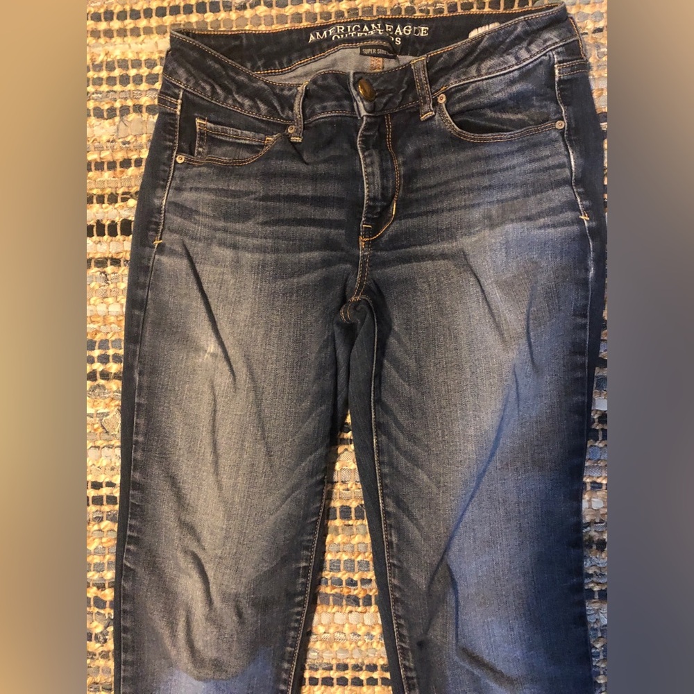 Dark Blue Women's Slim Super Stretch Jeans
American Eagle
Size 8
EUC